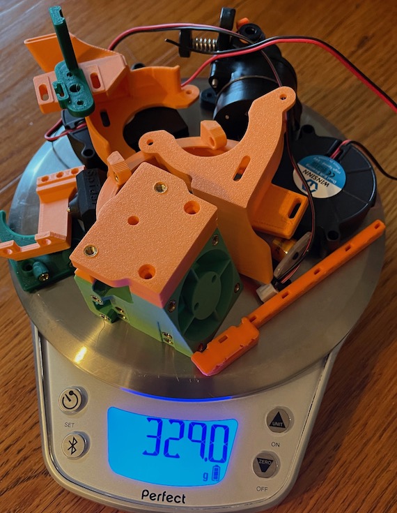 Hero Me parts on a scale weighing 86.4 grams